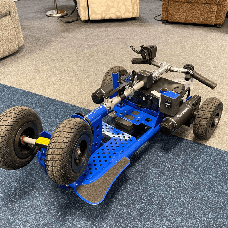 Close-up view of the SupaScoota Spartan being disassembled